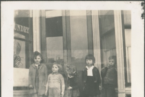 Children in front of a store (ddr-densho-321-878)