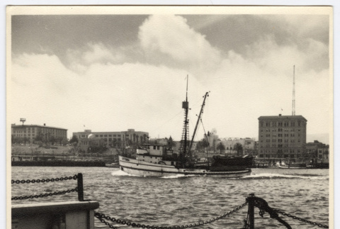 Boat with buildings in the background (ddr-densho-542-847)