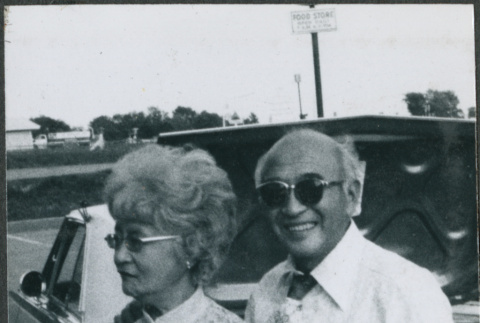 Chester and Agnes Sakura with flowers (ddr-densho-523-639)