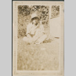 Man sitting on lawn (ddr-densho-316-269)