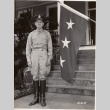 Walter C. Short standing near a flag (ddr-njpa-1-1910)