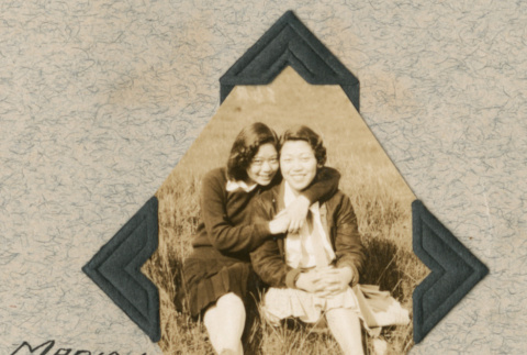 Marion and Mitzi Nakagawa sitting in grass (ddr-densho-383-60)
