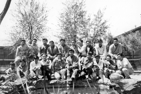 Japanese Americans behind homemade pond (ddr-densho-2-65)