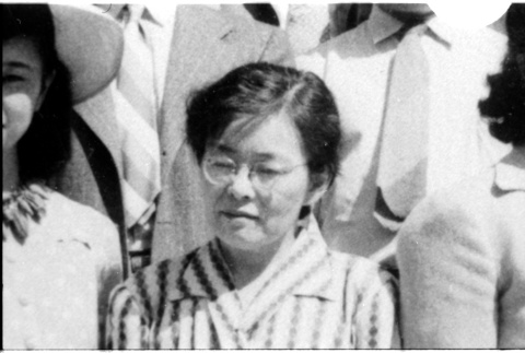 Woman in crowd (ddr-densho-1007-1277)