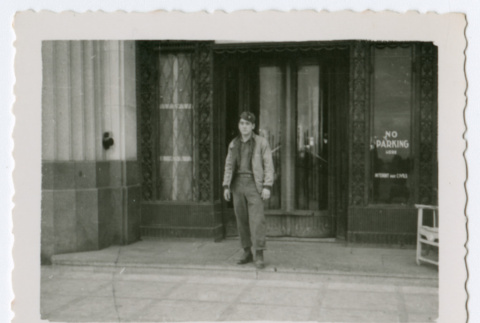 Soldier standing outside fo building (ddr-densho-368-204)