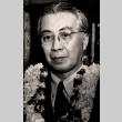 Jiro Osaragi wearing leis (ddr-njpa-4-1691)