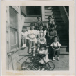 Group of children sitting on stairs (ddr-densho-426-987)