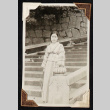 Woman on stone steps (ddr-densho-404-44)