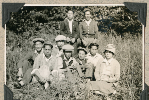 Group sitting in field (ddr-densho-383-246)
