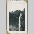 Man standing by a lake (ddr-densho-321-201)