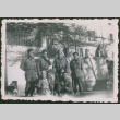 Soldiers pose with chldren and dog (ddr-densho-368-464)