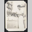 Gary Kikawa at Rohwer pharmacy (ddr-densho-542-693)