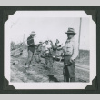 Men working in a field (ddr-densho-471-184)