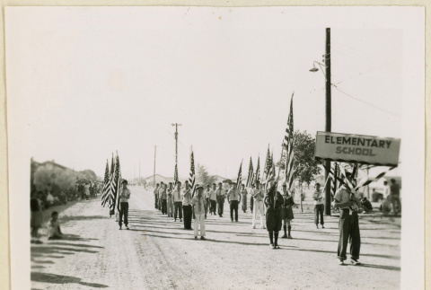 Students march in an Armistice Day parade (ddr-densho-37-1158)