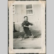 Toddler riding a tricycle (ddr-densho-321-237)