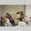 Three women sitting on a couch (ddr-densho-466-475)