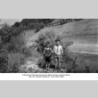 Two boys alongside river (ddr-ajah-6-463)