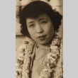 Woman wearing leis (ddr-njpa-4-2218)