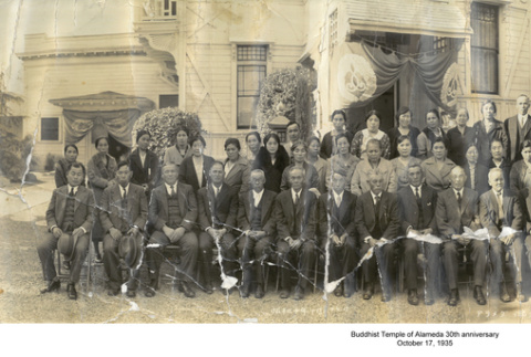 Panorama of large group of people posing outside building (ddr-ajah-3-180)