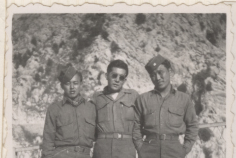 Three men standing by hillside (ddr-densho-466-351)