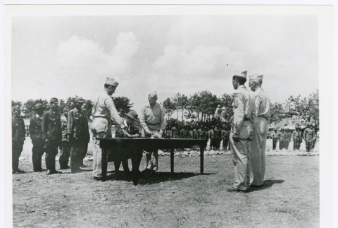 Japanese and American officers at surrender of the Ryukyus Islands (ddr-densho-1007-260)