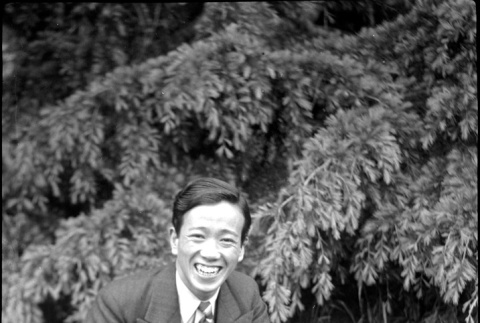 Man sitting on  lawn (ddr-densho-426-2178)