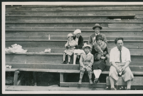 Family photo on bleachers (ddr-densho-378-723)