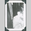 Photo of a woman holding a baby (ddr-densho-483-1288)