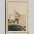 Man leaning on car (ddr-densho-316-265)