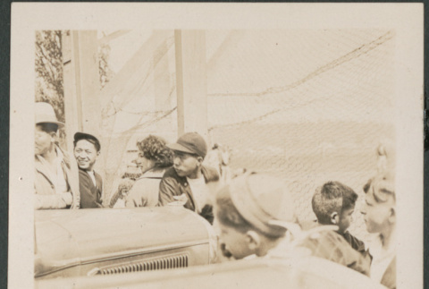 Group of boys by cars (ddr-densho-316-284)