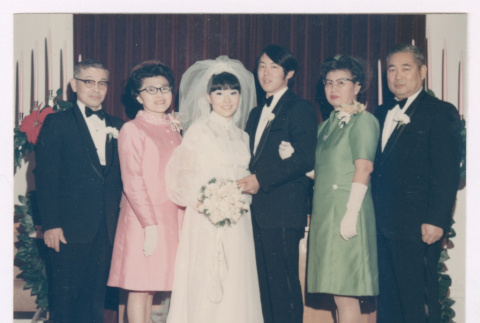 Glenn Isoshima and Karlyne Omoto's wedding picture with parents (ddr-densho-477-426)