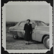A woman in front of a car (ddr-densho-300-424)