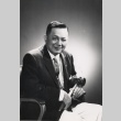 Judge sitting posing with a gavel (ddr-njpa-2-945)
