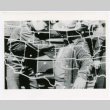 US outline superimposed over men (ddr-densho-1007-385)
