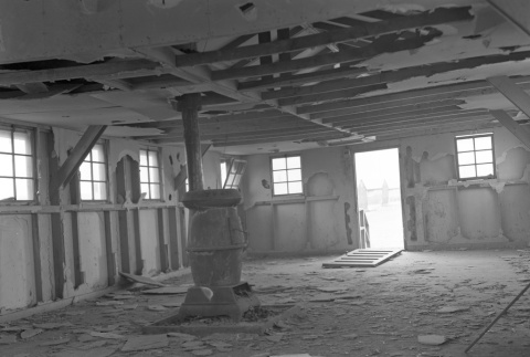 Interior of a barracks being renovated or demolished (ddr-fom-1-655)