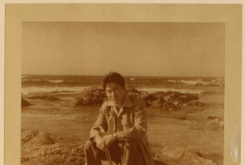 Gary Kikawa by the ocean (ddr-densho-542-28)