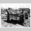 Nisei soldiers sorting confiscated goods (ddr-densho-114-23)