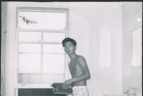 Man in boxers in bathroom (ddr-densho-523-269)