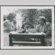 Three women sitting at a table (ddr-densho-293-156)