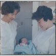 Two women with baby (ddr-densho-523-412)