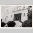 Tomoye and Henri Takahashi in front of house (ddr-densho-426-92)