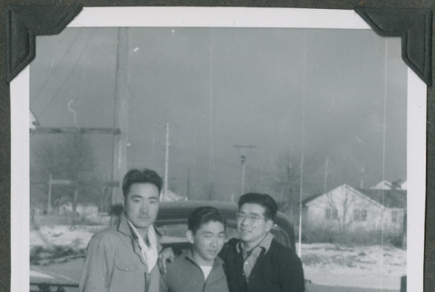 Three men in front of a car (ddr-densho-201-719)