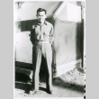 Soldier outside tent (ddr-densho-1007-849)