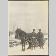 Two men and a horse-drawn sleigh in the snow (ddr-densho-278-237)