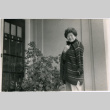 Tomoye Takahashi in doorway of house (ddr-densho-426-1125)
