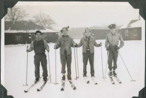 Four men on skis.  Joe Iwataki second from left (ddr-ajah-2-466)