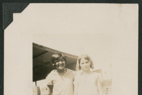 two girls in garden (ddr-densho-378-668)