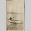 Kiku Fujii and a man in a row boat (ddr-densho-321-556)