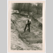 Man digging (ddr-densho-377-2018)