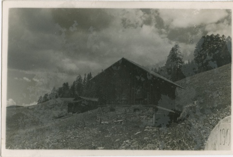 Headstone in front of building (ddr-densho-201-431)